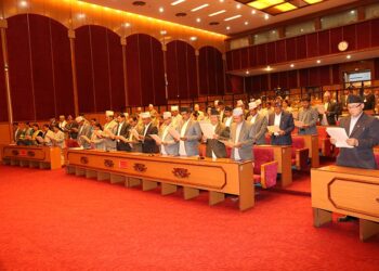 Newly elected members of the National Assembly, the Upper House in the Federal Parliament, taking oath of office and secrecy, at Parliament building in New Baneshwor, Kathmandu, on Wednesday, March 4, 2020. Photo: Nepal Parliament