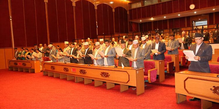 Newly elected members of the National Assembly, the Upper House in the Federal Parliament, taking oath of office and secrecy, at Parliament building in New Baneshwor, Kathmandu, on Wednesday, March 4, 2020. Photo: Nepal Parliament