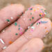 Close up side shot of microplastics lay on people hand. Concept of water pollution and global warming. Climate change idea. micro plastics concept in food and water or sea