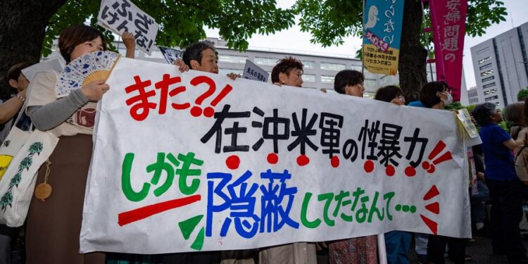(240703) -- TOKYO, July 3, 2024 (Xinhua) -- People gather in front of the country's Ministry of Foreign Affairs to protest against the Japanese government for concealing the alleged sexual assault cases involving U.S. military personnel in Japan from the public in Tokyo, Japan, July 2, 2024. Over 350 protesters gathered in front of the Ministry of Foreign Affairs in the heart of Tokyo to express their outrage over the silence of the government on Tuesday evening, wielding placards and banners that read "Silenced Cries of Okinawan Girls," "Restore Dignity to Okinawan Women," and "No More Gov't Cover-Ups of U.S. Troop Crimes."
   According to local media reports, a 21-year-old U.S. Marine in the southernmost Japan prefecture of Okinawa has been indicted on charges of nonconsensual sexual intercourse resulting in injury in May, following the indictment of a U.S. Air Force member for the alleged kidnap and sexual assault of a girl under 16 in December.
   The Japanese government, however, did not disclose the cases until local media exposed them at the end of June, sparking widespread anger across the nation. (Xinhua/Zhang Xiaoyu)